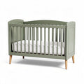 Wooden baby crib in sage green with adjustable mattress height 120 x 60 x 80cm